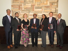 Bluewater Health recently presented its annual Physician Recognition Awards. Bluewater Health CEO Mike Lapaine, left, is pictured with Dr. Youssef Almalki, Dr Rosemary Lubynski, Dr. Ram Gidwani, Dr. Annie Kurian, Dr. Andre Rudovics, and Dr. Mike Haddad, chief of professional staff. (Handout)