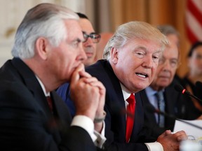 In this April 7, 2017, photo, President Donald Trump, joined by Secretary of State Rex Tillerson, left, speaks during a bilateral meeting with Chinese President Xi Jinping at Mar-a-Lago in Palm Beach, Fla. (AP Photo/Alex Brandon)