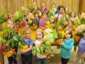 Sparks, Brownies and the Lucknow Girl Guides created their masterpiece table centrepieces at Lucknow Town Hall on Oct. 5, 2017. It was the largest variety of children from various schools in the area that the group ever had. Kids from Brookside, Lucknow Central, Ripley-Huron, Teeswater, St. Joseph's in Clinton and students from Wingham all attended. Each participant was bringing home a memorable piece for their families to enjoy just in time for the Thanksgiving weekend. Pictured: A collaboration of Sparks, Brownies and Lucknow Girl Guides come together at the Lucknow Town Hall to create Thanksgiving centrepieces for their families. (Ryan Berry/ Kincardine News and Lucknow Sentinel)