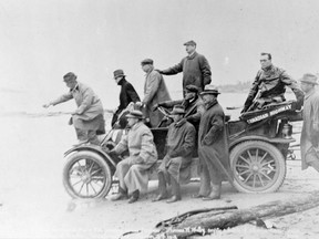 Richard Broadridge/Library and Archives Canada
Thomas Wilby emptying a bottle of Atlantic Ocean water into the Pacific Ocean after his cross-Canada road trip.