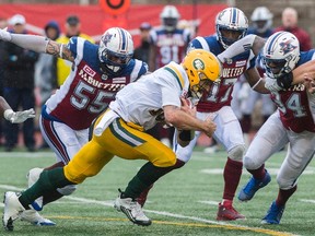 Edmonton Eskimos quarterback Mike Reilly dives for yardage during second half CFL football action against the Montreal Alouettes in Montreal, Monday, October 9, 2017.