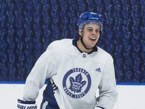 Toronto Maple Leafs' Auston Matthews couldn't stop smiling at practice a day after scoring the overtime winner to beat the Chicago Blackhawks. The team practised at the MCC in Toronto on Oct. 10, 2017. (Craig Robertson/Toronto Sun/Postmedia Network)
