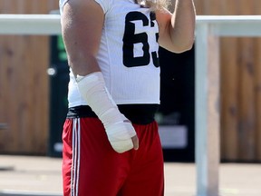 Offensive lineman Jon Gott appeared to have a left arm injury during the Ottawa Redblacks practice at TD Place on Sept. 13, 2017. (Julie Oliver/Postmedia)