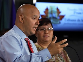 Indigenous survivors, Duane Morrisseau-Beck, Director and co-founder of National Indigenous Survivors of Child Welfare Network and Colleen Cardinal Coordinator hold a news conference in Ottawa on Parliament Hill on Monday October 10, 2017. THE CANADIAN PRESS/Fred Chartrand