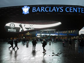 This Oct. 15, 2012 file photo shows spectators arriving at the Barclays Center in the Brooklyn borough of New York. (AP Photo/John Minchillo, File)