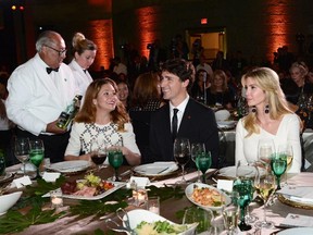 Prime Minister Justin Trudeau, wife Sophie Gregoire Trudeau and Ivanka Trump look on during the Fortune Most Powerful Women Summit and Gala in Washington, D.C., on Tuesday, Oct. 10, 2017. (Sean Kilpatrick/The Canadian Press)