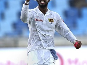 Sri Lanka’s captain Dinesh Chandimal celebrates after he catches the final ball, ending his team’s Test cricket match against Pakistan in Dubai, United Arab Emirates, on Oct. 10, 2017. (KAMRAN JEBREILI/AP)