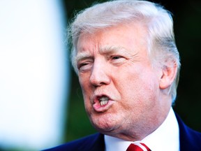 President Donald Trump speaks to reporters before leaving the White House in Washington, Saturday, Oct. 7, 2017 for a brief stop at Andrews Air Force Base in Md., on his way to Greensboro, N.C. (AP Photo/Manuel Balce Ceneta)