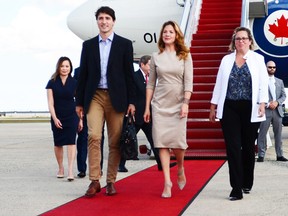 Prime Minister Justin Trudeau and Sophie Gregoire Trudeau depart the plane as they arrive in Washington, D.C., Tuesday, Oct.10, 2017. THE CANADIAN PRESS/Sean Kilpatrick