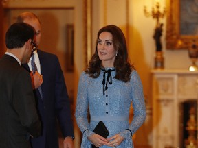 Britain's Prince Charles and Kate, the Duchess of Cambridge attend a reception at Buckingham Palace, London, to celebrate World Mental Health Day, Tuesday Oct. 10, 2017. (Heathcliff O'Malley/pool via AP)
