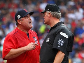 Manager John Farrell of the Boston Red Sox argues a call in the second inning and is ejected from game four of the American League Division Series against the Houston Astros at Fenway Park on October 9, 2017 in Boston, Massachusetts. (Photo by Maddie Meyer/Getty Images)