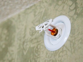 A sprinkler system is installed at Ashwood Manor Retirement Home in Lambeth, Ont. on March 11, 2014. (Mike Hensen/Postmedia Network)