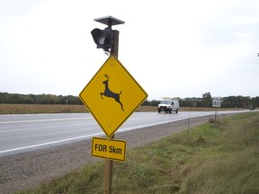 New deer collision advisory signs, like this on Glendon Road at Amiens Road, have been erected as part of the Middlesex County Ontario Provincial Police and the Middlesex Community Policing Committee's Middlesex Centre Deer Collision Prevention Strategy in Middlesex Centre, Ont. on Wednesday October 11, 2017. (DEREK RUTTAN, The London Free Press)