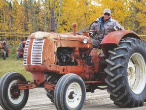 As part of Alberta Cultural Days this year, the Drayton Valley Ag Society hosted an Antique Tractor Pull at the Omniplex grounds over the September 30 weekend. Sunday day began with a pancake breakfast by the Shark Park. See more tractor pull photos on Page 19.