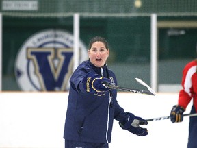 Stacey Colarossi, head coach of the Laurentian Voyageurs women's hockey team gives instructions to her team as they run through some drills during team practice in Sudbury, Ont. on Wednesday October 11, 2017. Gino Donato/Sudbury Star/Postmedia Network