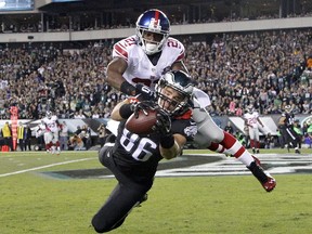 Philadelphia Eagles tight end Zach Ertz makes a touchdown catch against New York Giants cornerback Dominique Rodgers-Cromartie during an NFL game on Oct. 12, 2014. (AP Photo/The Philadelphia Inquirer, Ron Cortes)
