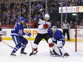 Jimmy Hayes in front of Frederik Andersen as the Toronto Maple Leafs host the New Jersey Devils at the Air Canada Centre in Toronto on Oct. 11, 2017. (Michael Peake/Toronto Sun/Postmedia Network)