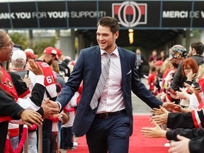 Logan Brown of the Ottawa Senators walks the red carpet prior to the start of a game against the Detroit Red Wings at Canadian Tire Centre on Oct. 7, 2017. (Jana Chytilova/Freestyle Photography/Getty Images)