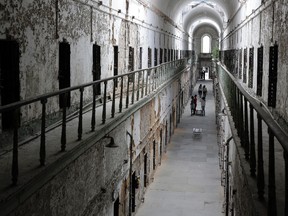 In this Sept. 27, 2013, file photo, Eastern State Penitentiary in Philadelphia is shown. The penitentiary took in its first inmate in 1829, closed in 1971 and reopened as a museum in 1994. The site is mentioned in the book "Ghostland: An American History in Haunted Places." (AP Photo/Matt Rourke, File)