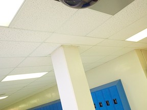 In this stock photo, a CCTV surveillance camera is seen in a school hallway. (Getty Images)