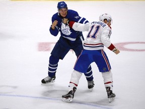 Toronto Maple Leafs' Zach Hyman fights against Montreal Canadiens' Brendan Gallagher during the first period of their NHL pre-season game in Toronto on Sept. 25, 2017. (THE CANADIAN PRESS/Jon Blacker)