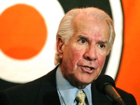In this Feb. 16, 2004, file photo, Philadelphia Flyers' owner Ed Snider responds to a question during a news conference in Philadelphia. (AP Photo/George Widman, File)