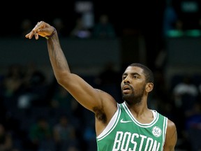 Kyrie Irving of the Boston Celtics reacts after a shot against the Charlotte Hornets during their game at Spectrum Center on Oct. 11, 2017 in Charlotte, North Carolina (Streeter Lecka/Getty Images)