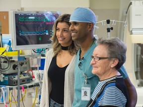 From left, former patient Racha Kamal, Dr. Jeevan Nagendran, a cardiac surgeon at the Mazankowski , and Anne Rocko on October 12, 2017. Photo by Shaughn Butts / Postmedia