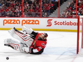 Craig Anderson of the Ottawa Senators makes a last ditch save against the Detroit Red Wings in the third period at Canadian Tire Centre on Oct. 7, 2017. (Jana Chytilova/Freestyle Photography/Getty Images)