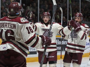 Adam Timleck (18) of the Peterborough Petes celebrates a goal against the Kingston Frontenacs during Ontario Hockey League action at the Peterborough Memorial Centre on Thursday night. (Photo by Claus Andersen/Getty Images)
