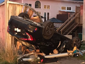 A car ended up in a yard on Maple Park Private after a rollover on Wednesday, Oct. 11, 2017. OTTAWA PARAMEDIC SERVICE / .