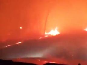 A California couple shot this video as they attempted to outrun wildfire.