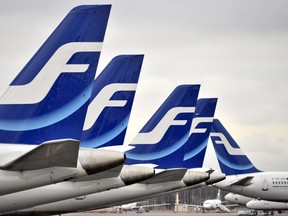Finnair planes are grounded at Helsinki airport on November 16, 2009. (MARKKU ULANDER/AFP/Getty Images)