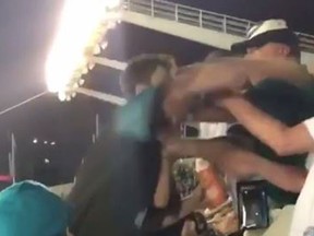 A Carolina Panthers fan sucker punches a seated Philadelphia Eagles fan after Thursday night's game in Charlotte, North Carolina. (Instagram/seangirvan)