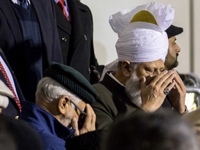 The World Head of the Ahmadiyya Muslim Jama`at, the Caliph, His Holiness, Hazrat Mirza Masroor Ahmad leads a silent prayer at the Baitun Nur Mosque in Calgary, Alberta on Sunday November 13, 2016 during his last stop on his tour of Canadian Ahmadiyya mosques. (Mike Drew/Postmedia Network)