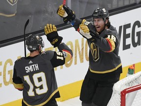 James Neal of the Vegas Golden Knights celebrates with teammate Reilly Smith after Neal scored a first-period goal against the Arizona Coyotes at T-Mobile Arena on Oct. 10, 2017. (Ethan Miller/Getty Images)
