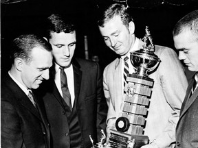 The late Roger Crozier, left, the late Bob Cook, Walt McKechnie (holding an LMHA award) and the late Darryl Edestrand, 1968.