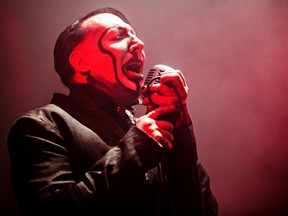 Marilyn Manson broke his fibula after a large prop toppled over and crushed him onstage during a show last month. (Codie McLachlan/Postmedia Network/Files)