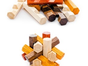 Wooden geometric puzzle made from many pieces with six grains