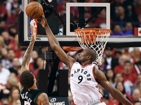 In this April 24, 2017, file photo, Toronto Raptors forward Serge Ibaka blocks a shot from Milwaukee Bucks forward Michael Beasley during the first half of Game 5 in the first-round NBA basketball playoffs in Toronto. (Frank Gunn/The Canadian Press)