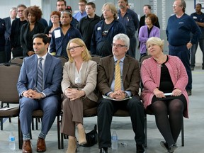 London Liberal MPs Peter Fragiskatos, left, and Kate Young join Ian Howcroft, senior vice-president of the Canadian Manufacturers and Exporters, and MPP Deb Matthews at Friday?s announcement of $5 million in federal and provincial grants to help auto partsmaker Sodecia London with a $30-million expansion. (MORRIS LAMONT, The London Free Press)