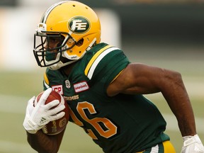 Edmonton's Chris Edwards (26) runs the ball during a CFL game between the Edmonton Eskimos and the BC Lions at Commonwealth Stadium in Edmonton on Friday, July 28, 2017.