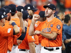 Justin Verlander of the Houston Astros is introduced prior to Game 1 of the American League Championship Series against the New York Yankees at Minute Maid Park on Oct. 13, 2017. (Elsa/Getty Images)
