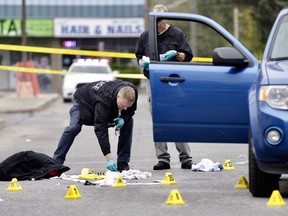 A man, 18, was killed in a double stabbing outside a McDonald's restaurant on Lakeshore Rd. E., just west of Cawthra Rd., in Mississauga on Saturday, Oct. 14, 2017. (Ernest Doroszuk/Toronto Sun)