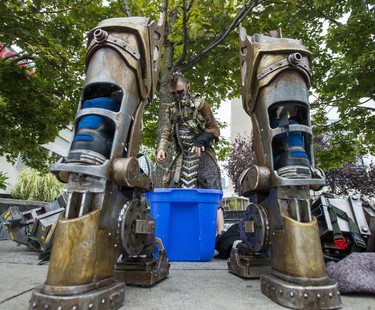 Toronto-based prop maker/cosplayer Mike Cameron gets suited up in his costume along Bremner Blvd in downtown Toronto, Ont. on Thursday October 12, 2017. Cameron just returned from New York Comic Con. He won Best in Category: Armour, as well as 2nd place overall. Additionally, he took best in show at Toronto's Fan Expo last month. (Ernest Doroszuk/Toronto Sun)