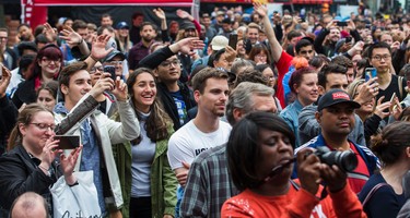 A packed crowd for the 8th Annual Smoke�s Poutinerie World Poutine Eating Championship held at Yonge-Dundas Square in downtown Toronto, Ont.  on Saturday October 14, 2017. Ernest Doroszuk/Toronto Sun/Postmedia Network