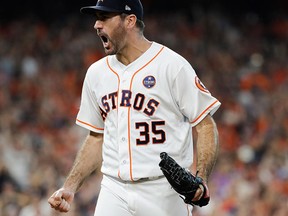 Houston Astros starting pitcher Justin Verlander reacts after getting New York Yankees' Greg Bird to ground out during the ninth inning of Game 2 of baseball's American League Championship Series Saturday, Oct. 14, 2017, in Houston. (AP Photo/David J. Phillip)