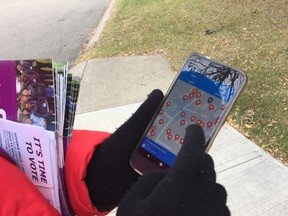 Ward 11 council candidate Keren Tang uses a mobile phone app called FieldEdge to track where she has door knocked, and where her volunteers have delivered flyers. Photo by Janet French