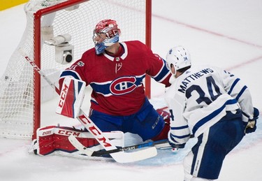 Toronto Maple Leafs' Auston Matthews scores on Montreal Canadiens goalie Carey Price during overtime NHL hockey action in Montreal, Saturday, October 14, 2017. THE CANADIAN PRESS/Graham Hughes