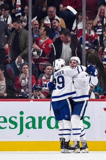 MONTREAL, QC - OCTOBER 14:  Auston Matthews #34 of the Toronto Maple Leafs celebrates his overtime goal with teammate William Nylander #29 against the Montreal Canadiens during the NHL game at the Bell Centre on October 14, 2017 in Montreal, Quebec, Canada.  The Toronto Maple Leafs defeated the Montreal Canadiens 4-3 in overtime.  (Photo by Minas Panagiotakis/Getty Images)